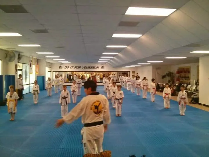 Students and families together at APEX Taekwondo.